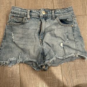 ripped light wash jean shorts